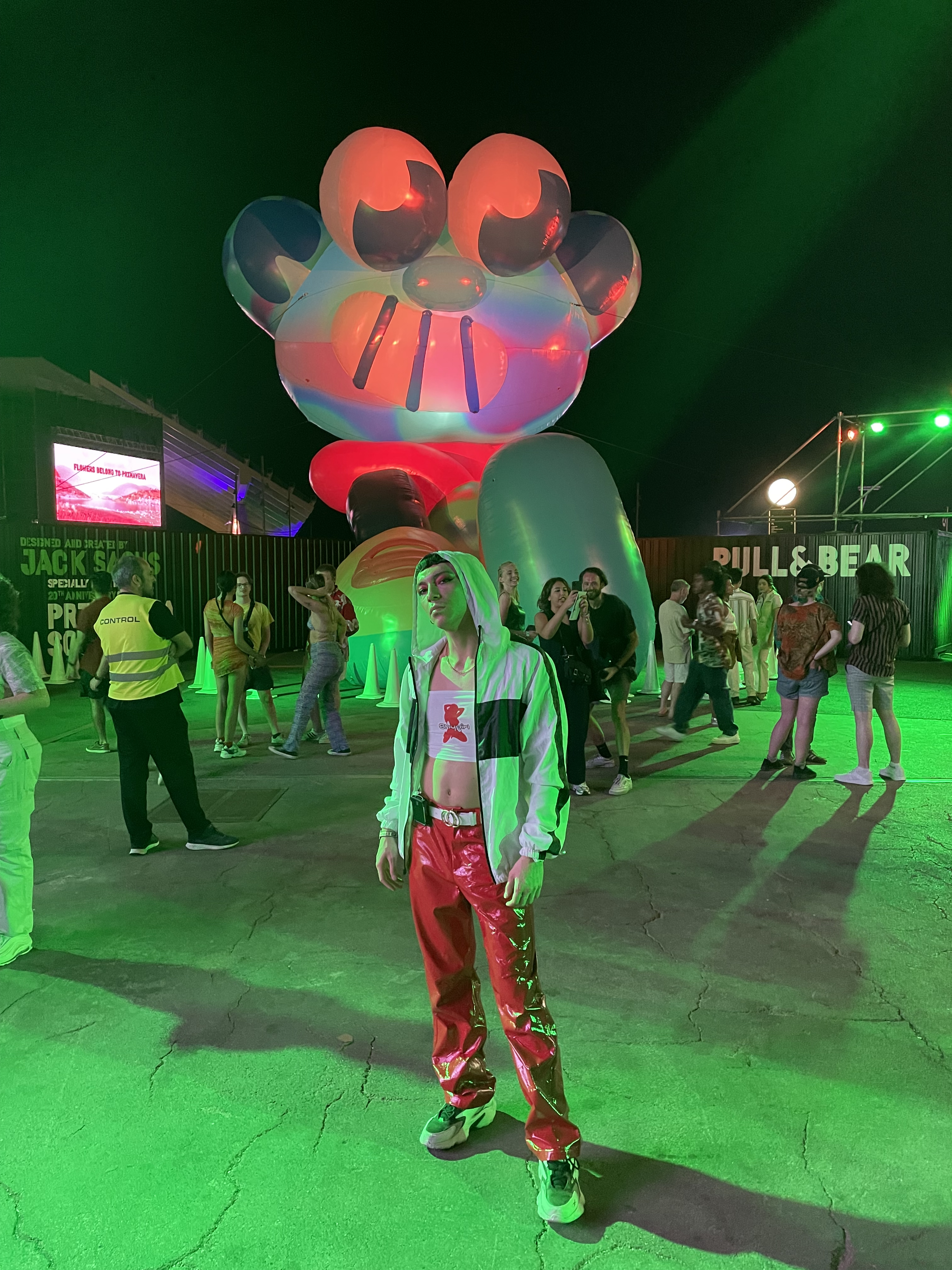 Stephen wearing red vinyl pants and Shygirl tube-top