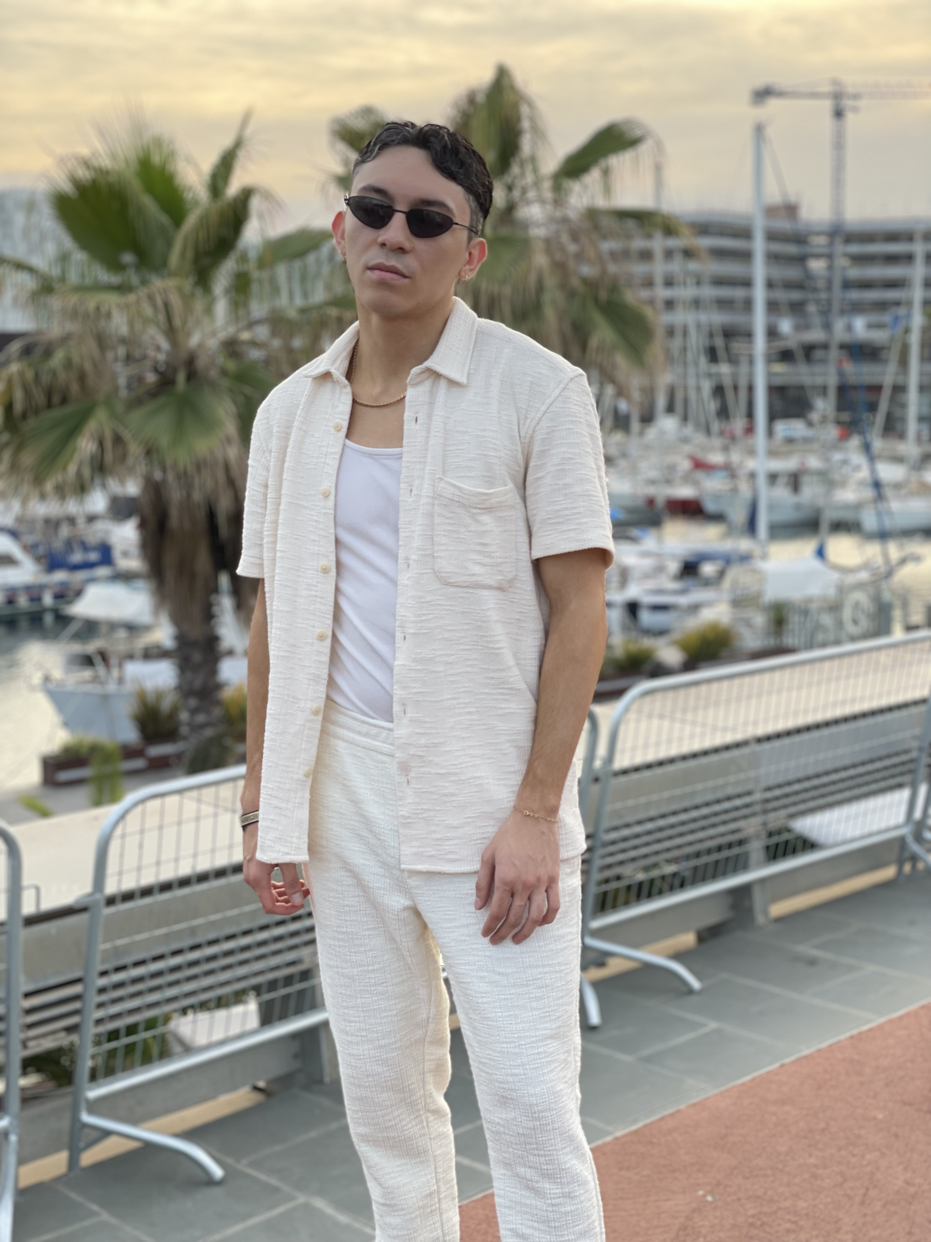 Stephen wearing all-ecru outfit